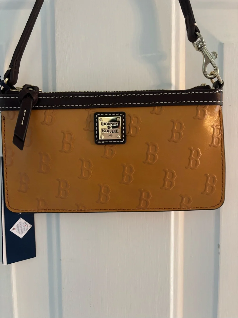 Dooney & Bourke Mustard Yellow Logo-Embossed Wristlet with Brown Trim